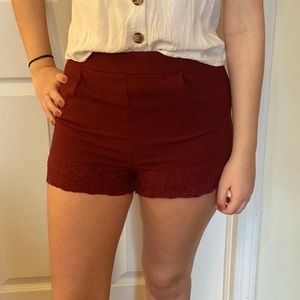 Francesca’s red shorts